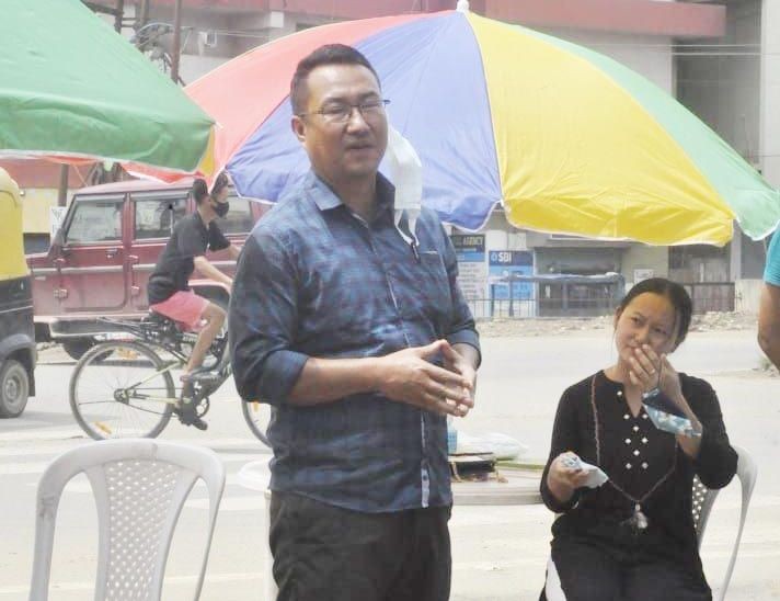DMC Administrator Albert Ezung launching the COVID information tool booth and medical aid booth at Burma Camp and Khermahal Junction on July 9. (Photo Courtesy: Can Youth)